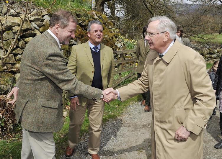 Prince Richard meets Malcolm Thomas, vice-chairman of R.A.B.I, as Chris Riddle, R.A.B.I chairman looks on