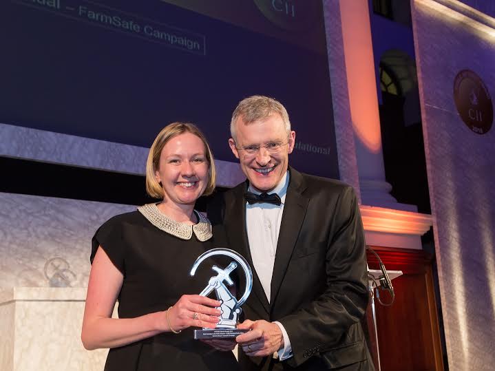 Clare Green from Cornish Mutual collects the award from Jeremy Vine
