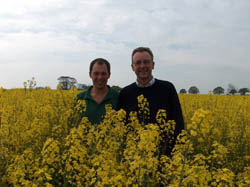 John Barrett and Richard Peck of Sentry Ltd in a field of Astrid