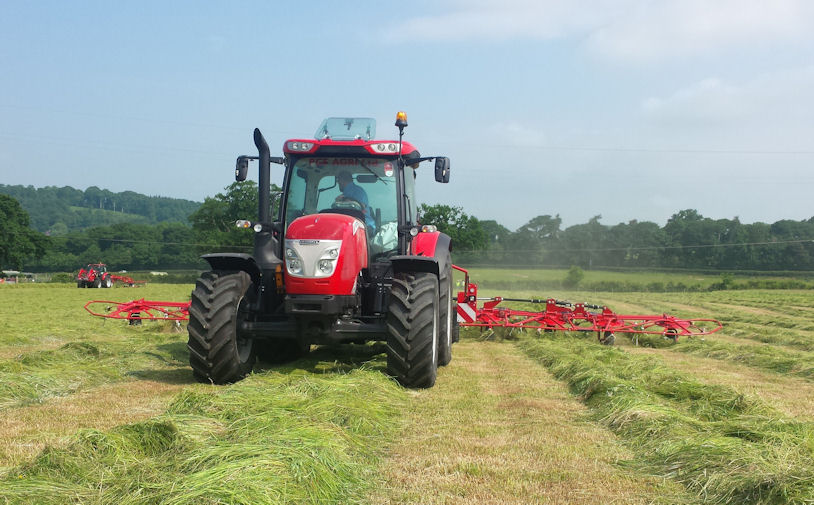 This 121/133hp McCormick X6.430LS operated a big trailed tedder.