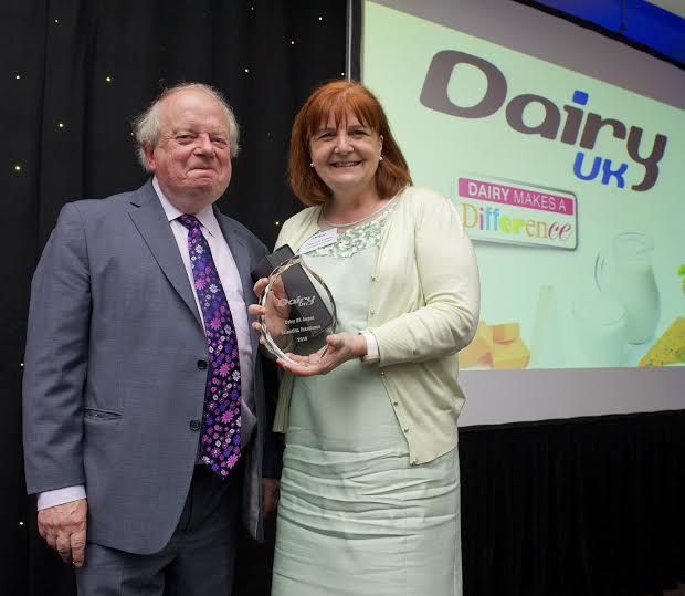 John Sergeant with Catherine Collins RD accepting her Dairy UK Award for Scientific Excellence