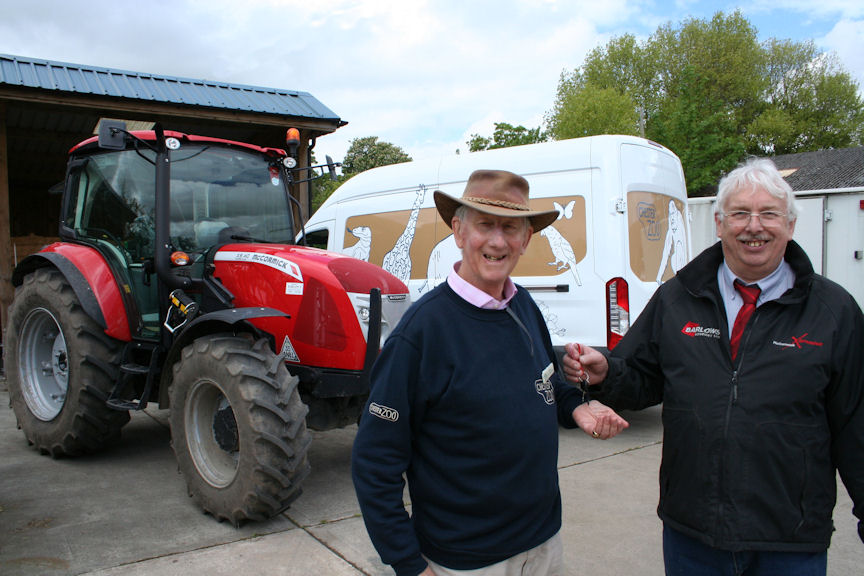 Anthony Hutchinson (left) receives the keys from Paul Williams of Barlows Agri.