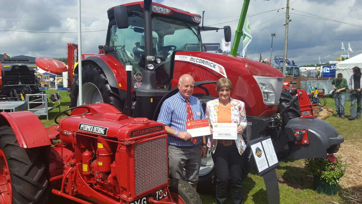 Mike and Penny Pullin with a clutch of Three Counties Show 'best stand' awards.