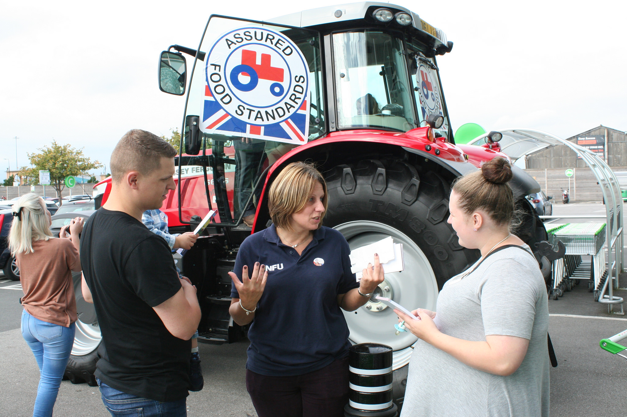 NFU Cheshire County Adviser Helen Wainwright promotes the Red Tractor logo to shoppers in Manchester
