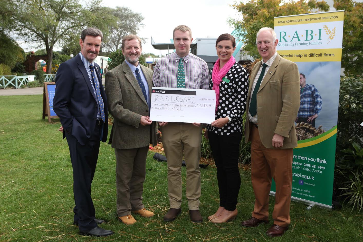 (L-R) Ken Nottage, Chief Executive of the Three Counties Society, Malcolm Thomas MBE, Chairman of RABI, Jack Walton, Becky Davies, RABI Regional Manager and Clive Roads, Livestock Auctioneer at McCartneys