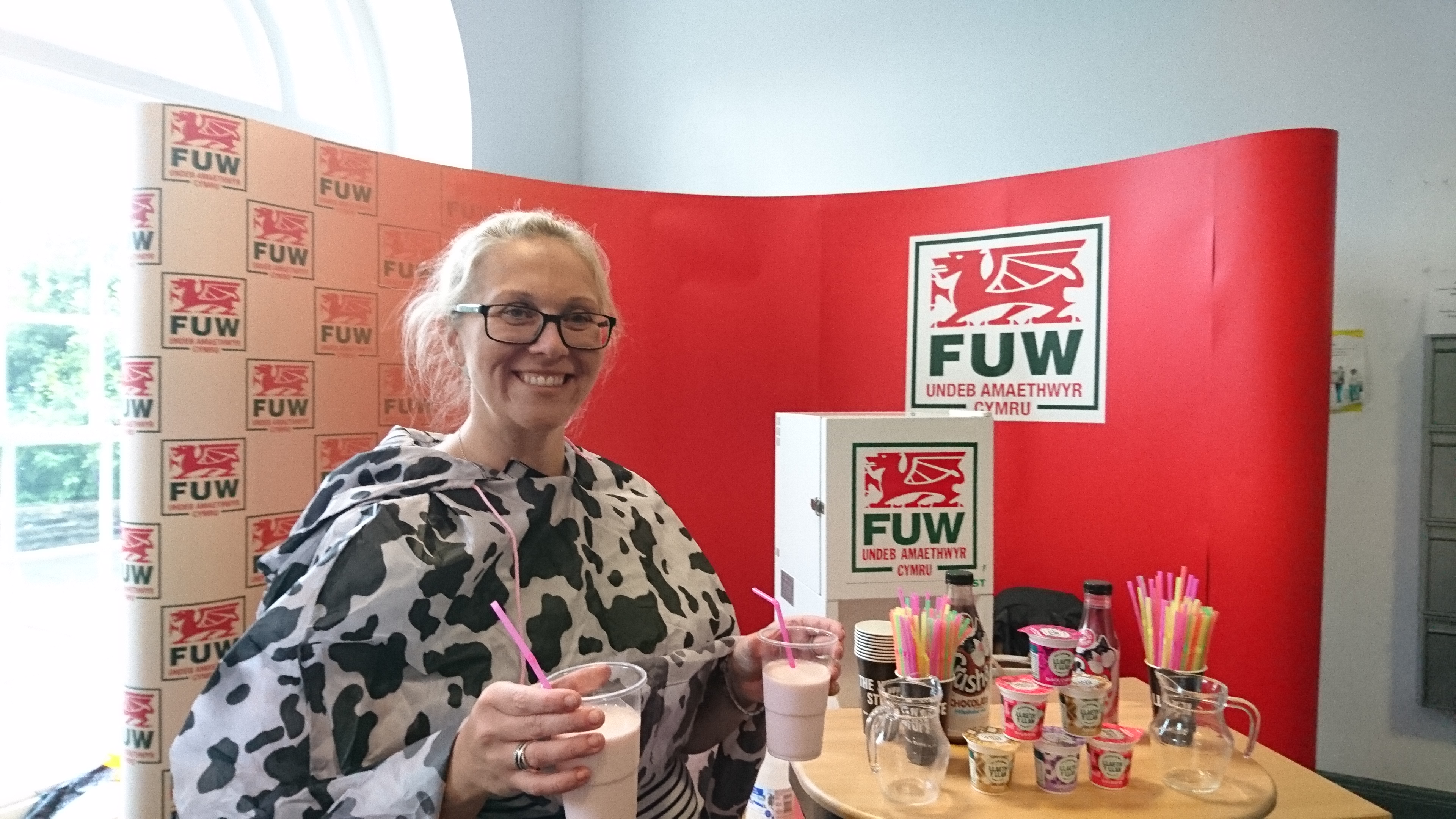 FUW Ceredigion County Executive Officer Mared Rand Jones promotes benefits of milk and udder-things at Aberystwyth University Freshers Fair