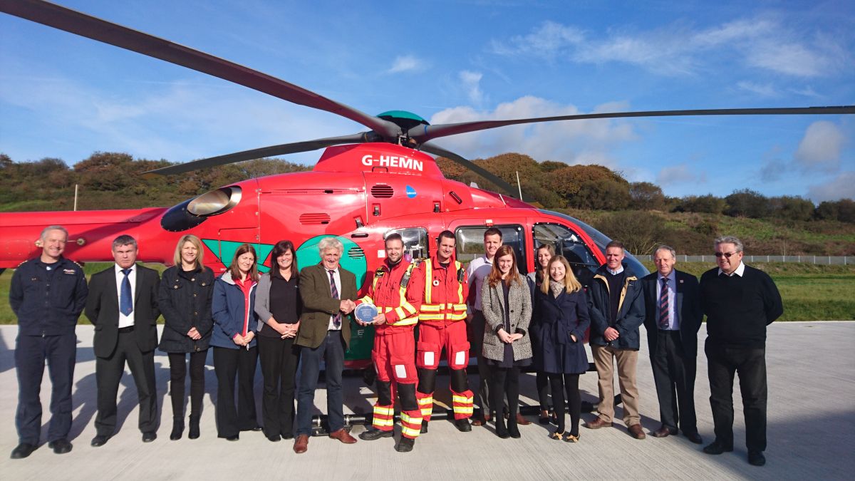Wales Air Ambulance receiving their award from FUW President Glyn Roberts.