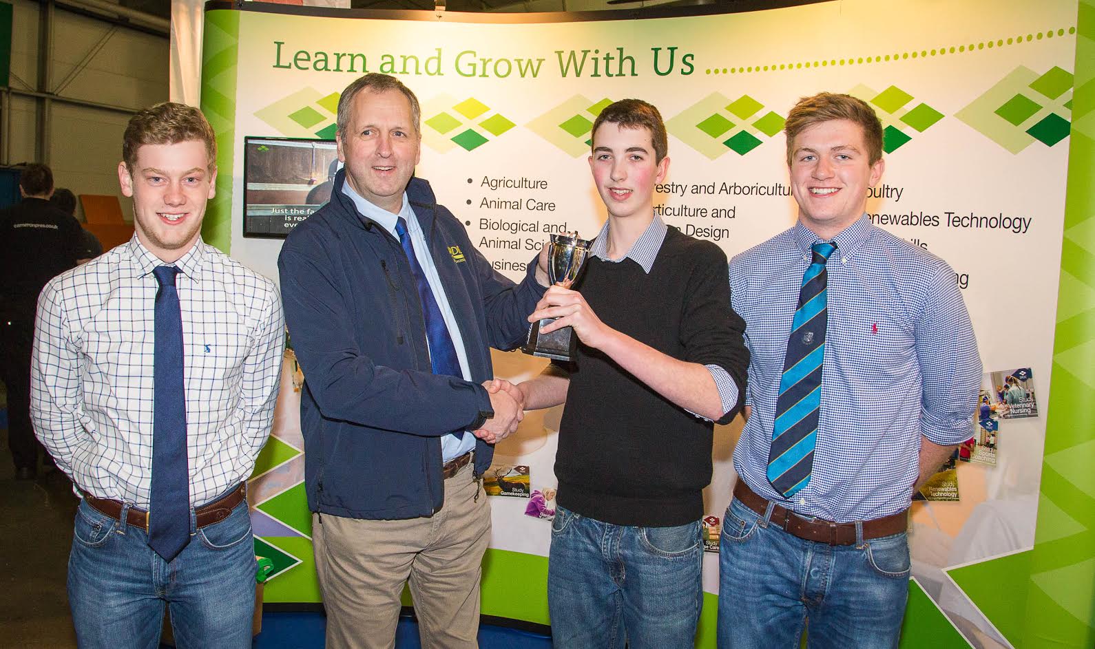 Three of the jubilant winning team from SRUC’s Barony Campus receive the 2016 Mains of Loirston Winter Wheat Challenge trophy