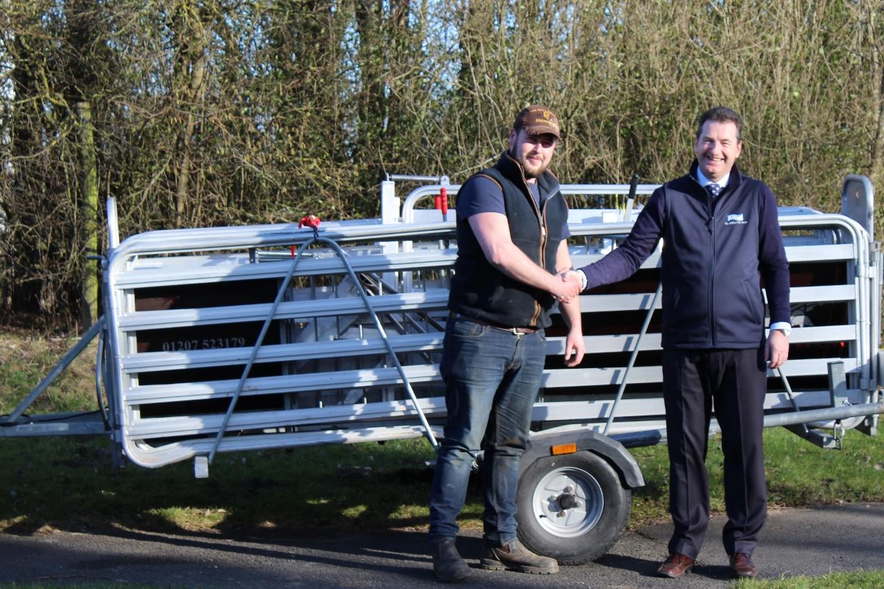 Scottish sheep farmer John Struthers with his prize, an £8500 Alligator mobile sheep handling system