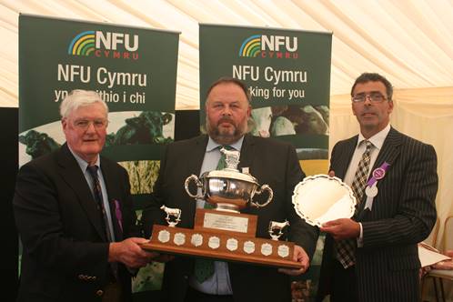 Geraint Davies, representing the Davies family, award winner Huw Thomas from Puffin Produce and NFU Cymru Pembrokeshire County Chairman Jeff Evans