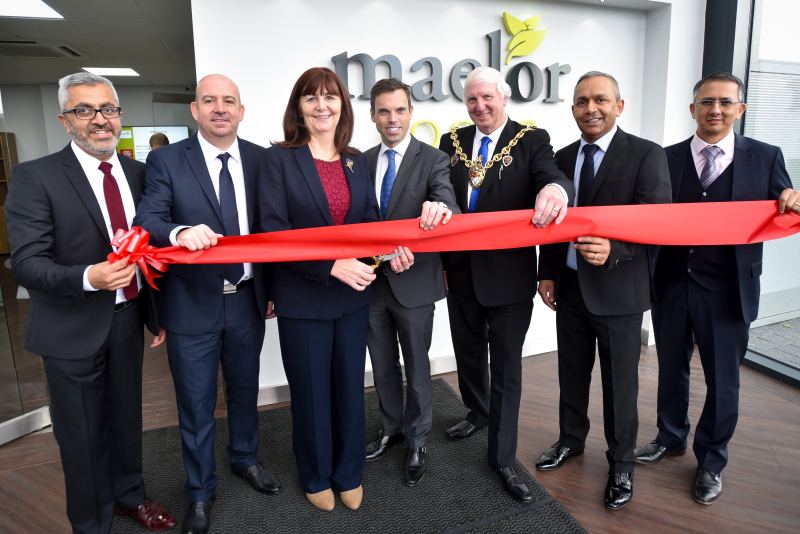 (L - R) Director Mulkh Mehta, Commercial Director Steve Hammond, Lesley Griffiths, Ken Skates, Councillor John Pritchard, Managing Director Raj Mehta and Finance Director Gurinder Sehmi