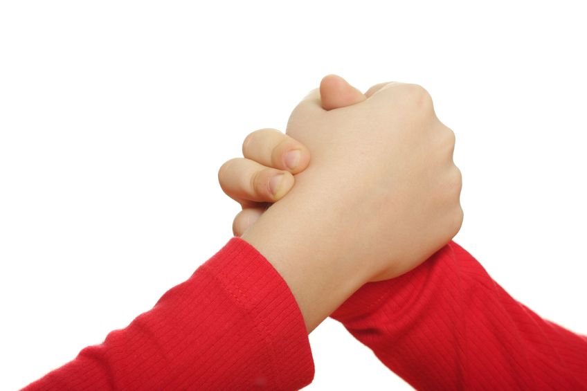 The young farmer broke her arm while wrestling with another woman