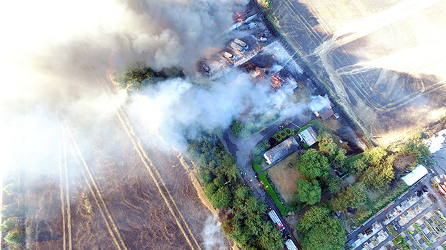 An area of mixed grassland and crops, covering about 30 hectares (74 acres), was destroyed (Photo: Thames Valley Fire Control Service)
