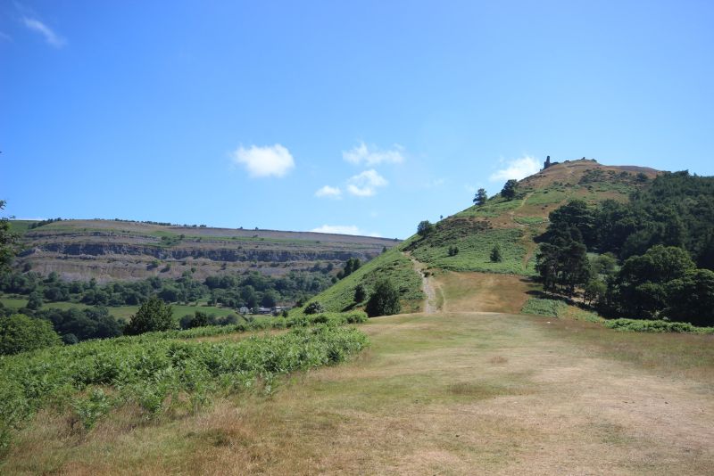 It lies within the Clwydian Range and the Dee Valley area of Outstanding Natural Beauty