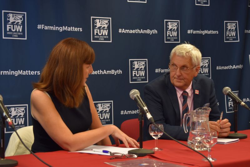 Welsh government's Cabinet Secretary, Lesley Griffiths (L) with FUW President, Glyn Roberts at the weather summit