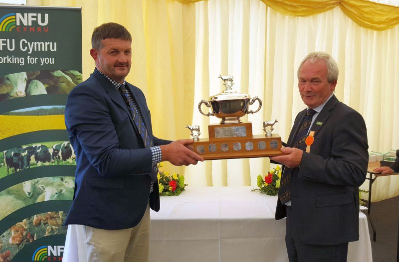 Stephen James (right) has received the Idris Davies Memorial Award 2018 for his contribution to Welsh dairy farming