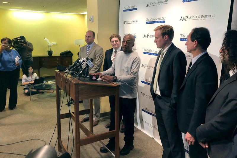 Plaintiff Dewayne Johnson, center at podium, surrounded by his attorneys, takes questions from the media after the Monsanto trial in San Francisco (Photo: Paul Elias/AP/Shutterstock)