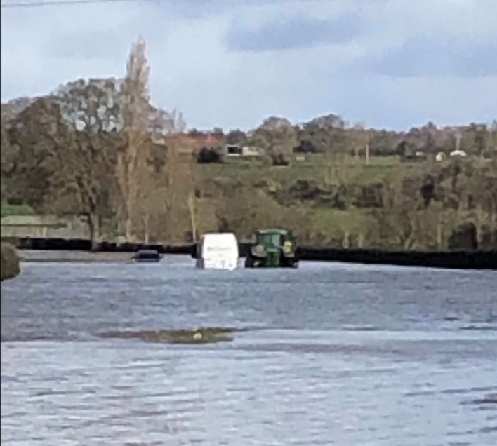 A farmer helped stranded motorists caught in flooding in Wrexham (Photo: North Wales Police)