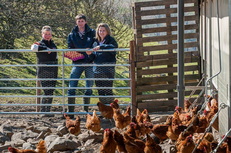 Aled Jones (centre) has received a six-figure financial package to expand his poultry business