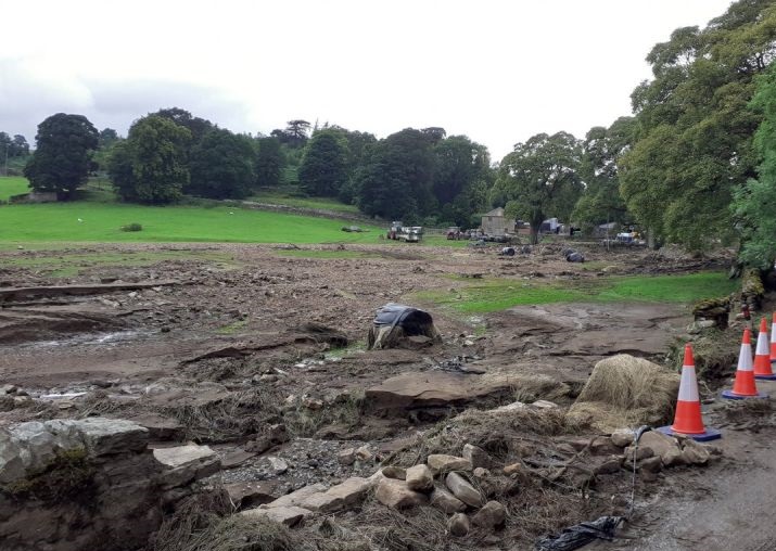 Rural roads and farm walls were destroyed by the flood water (Photo: Dales Police/Twitter)