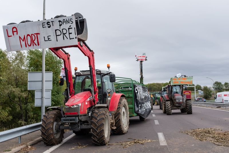 French farmers block the A6 highway entrance with their tractors, near Dijon, during a demonstration called by unions (Photo: KONRAD K/SIPA/Shutterstock)