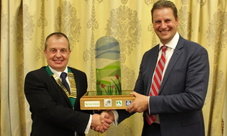 The Northern Irish farmer (L) has been honoured with a major annual grassland award