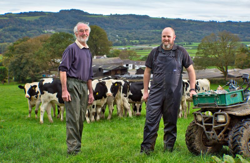Farmer Bryan Thomas (L) found young herdsman Dyfrig Davies via the industry programme