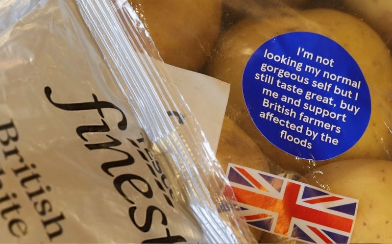 Stickers on spud packets highlight the flood impact many farmers are still facing