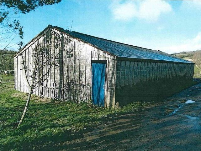The landowner built an unauthorised chicken barn within the Dorset Area of Outstanding Natural Beauty (AONB)