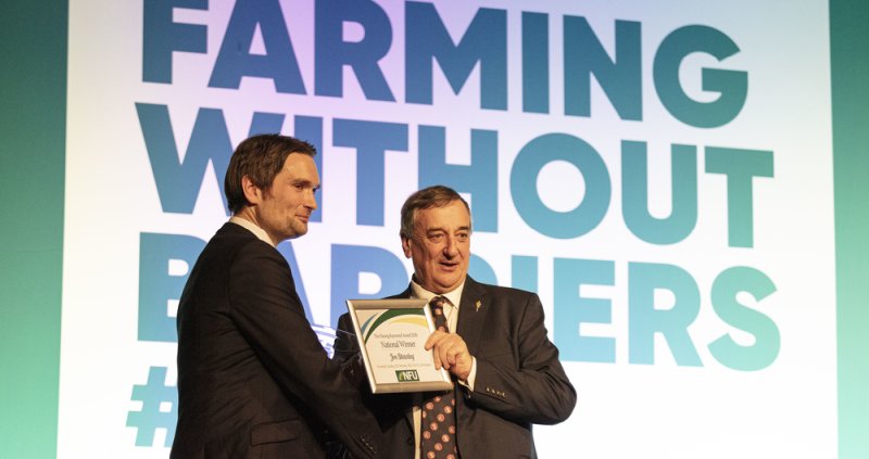 Leicestershire farmer Joe Stanley (L) has been honoured for his dedication to advancing the British farming industry