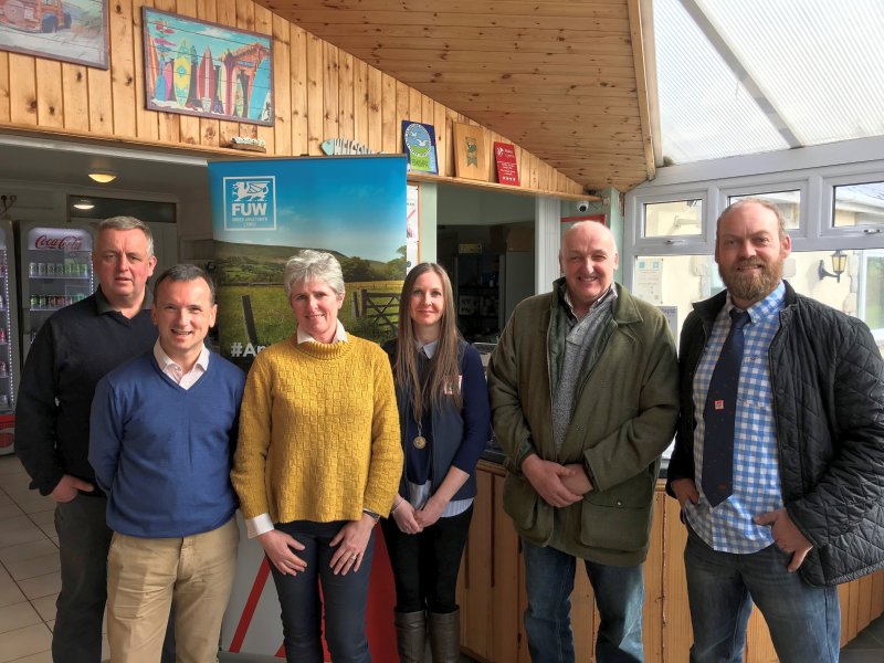 MP Alun Cairns (second left) met with the South Wales farming family to hear of their concerns