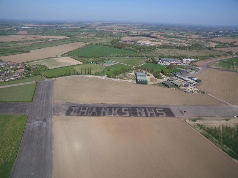 The sprayer nozzles shut off to create the giant lettering in water – thanking the NHS