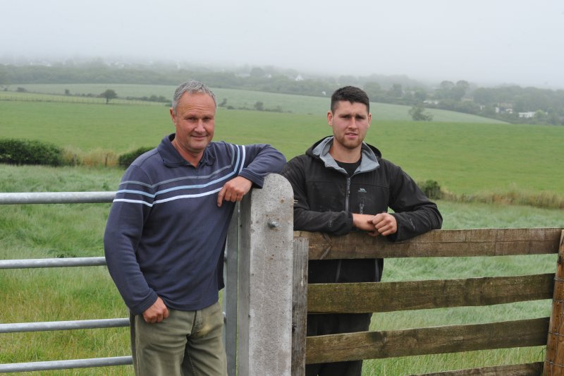 Beef finisher Edward Griffith (L) said he hopes to cut production costs with home-grown crimped barley