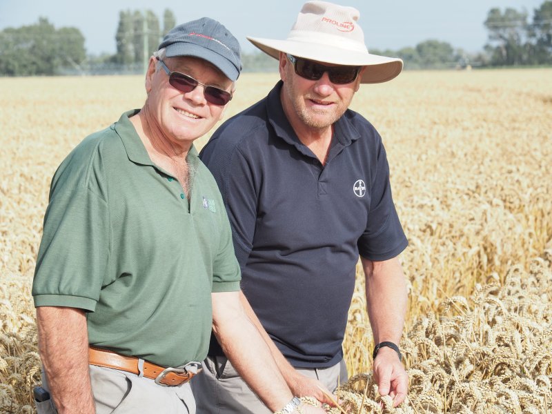 Eric Watson (L) broke the world record with a massive 17.398 tonne per hectare wheat crop