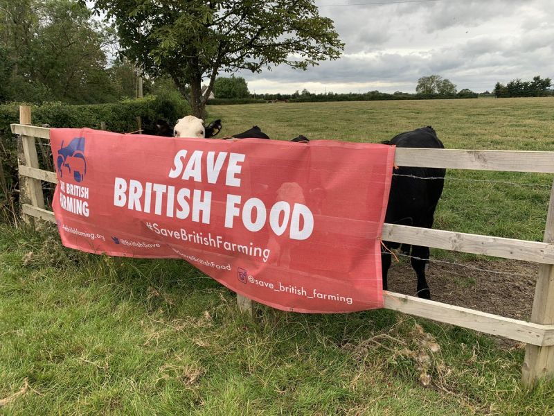 The new banners urge MPs to uphold UK standards in any post-Brexit trade deal (Photo: Save British Farming/Twitter)