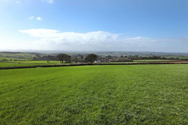 The farm effectively lies within a ring fence, part divided only by a quiet parish lane.