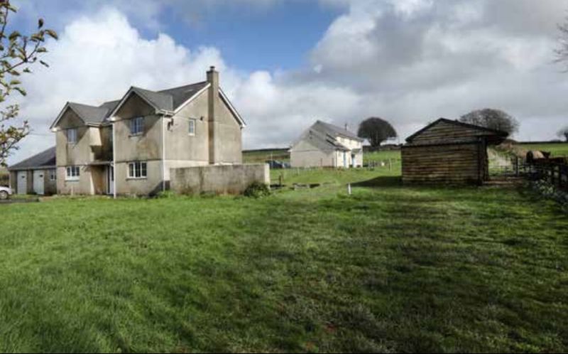 The property, on the market with Kivells, has a modern farmhouse with three/four bedrooms