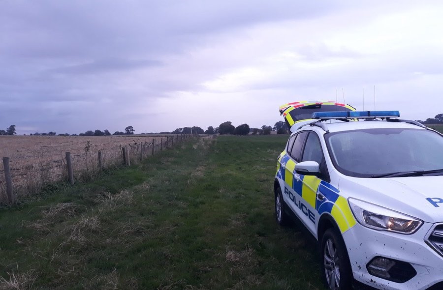 Police arrived at the scene and encountered three suspected poachers with dogs walking across a farm