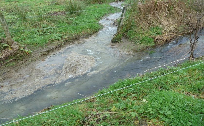 A Carmarthenshire farmer has been fined for persistently polluting a river