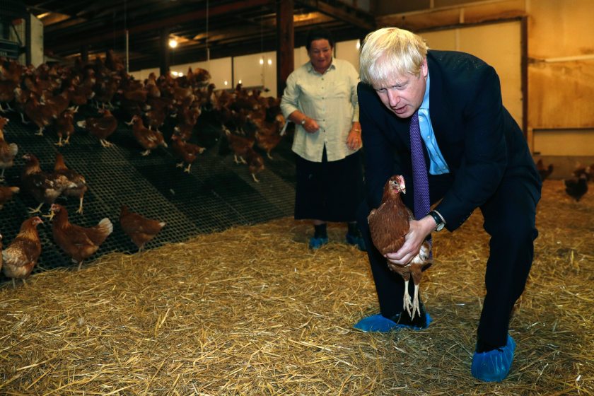 Boris Johnson on a visit to a poultry farm in Newport, Wales. Farmers have warned of the detrimental impact a no-deal would bring to the sector