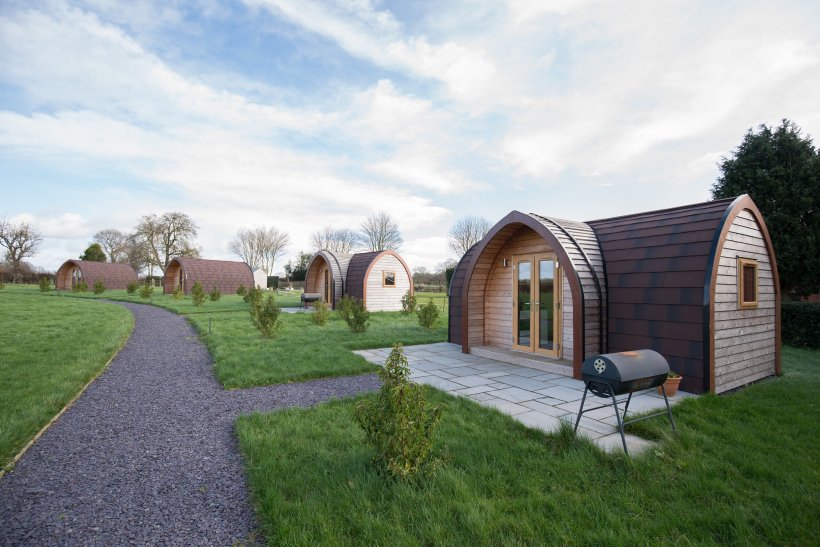 The farm's pods offer a high-end, self-contained glamping experience
