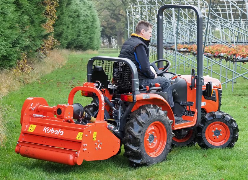 The ROPS is positioned in front of the operator platform