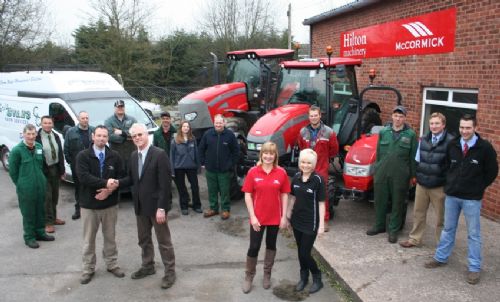 At your service – the Chris Evans Farm Services and Hilton Machinery teams celebrate Hilton’s move into new premises on the Adderley Road Industrial Estate in Market Drayton. Julian Kearne is pictured front left with Chris Evans.