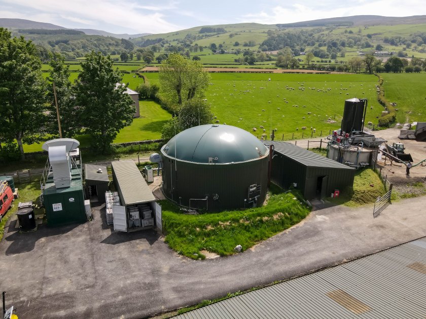Farmer Philip Hughes invested in an anaerobic digester that is fed with the farm’s cow manure