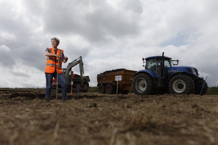 450 tonnes of soil is being taken by tractor and trailer to a pre-prepared field nearby