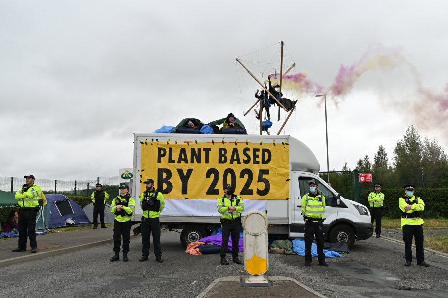 Around 50 environmental activists blocked the entrance and exit to Arla’s Aston Clinton plant