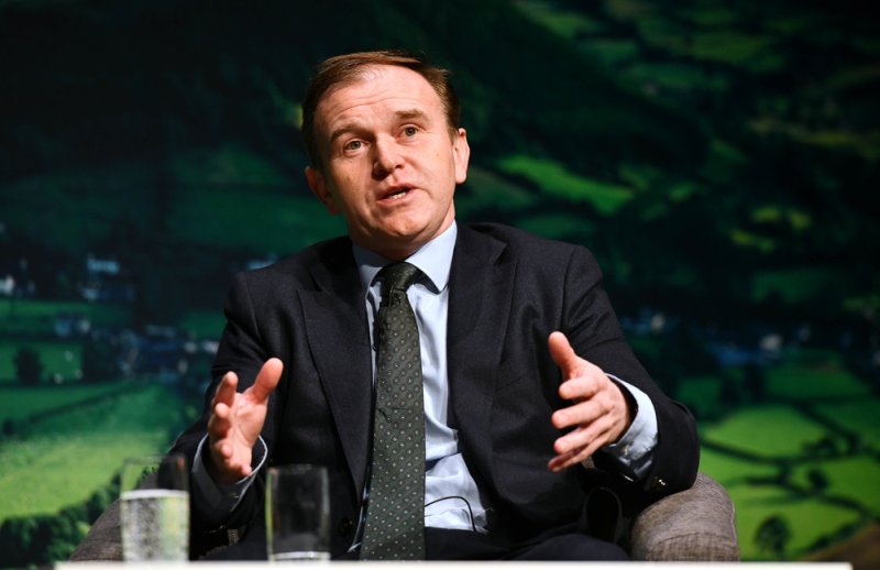 George Eustice said government was working on a new tax for parts of the food sector that emit the most pollution