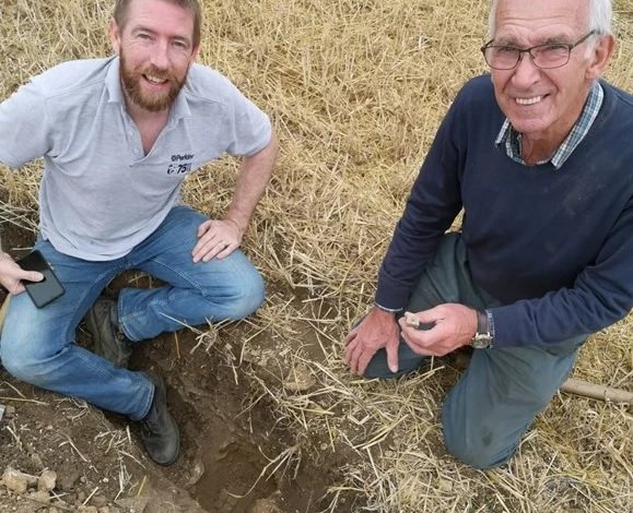 Jim Irvine and Brian Naylor pictured discovering the Roman mosaic (Photo: Historic England)