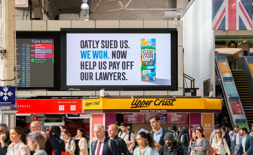Glebe Farm's billboards, which were in place for one day only, called out the recent court case it had with Swedish oat milk giant Oatly