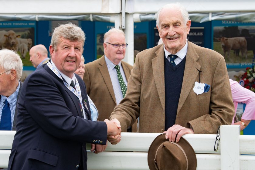 Major David Walter (R) has been awarded for his exceptional contribution to the world of Charolais cattle breeding